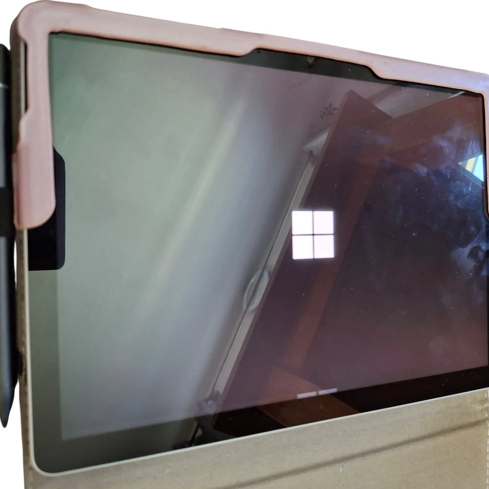Sleek Silver Tablet with Stand and Stylus